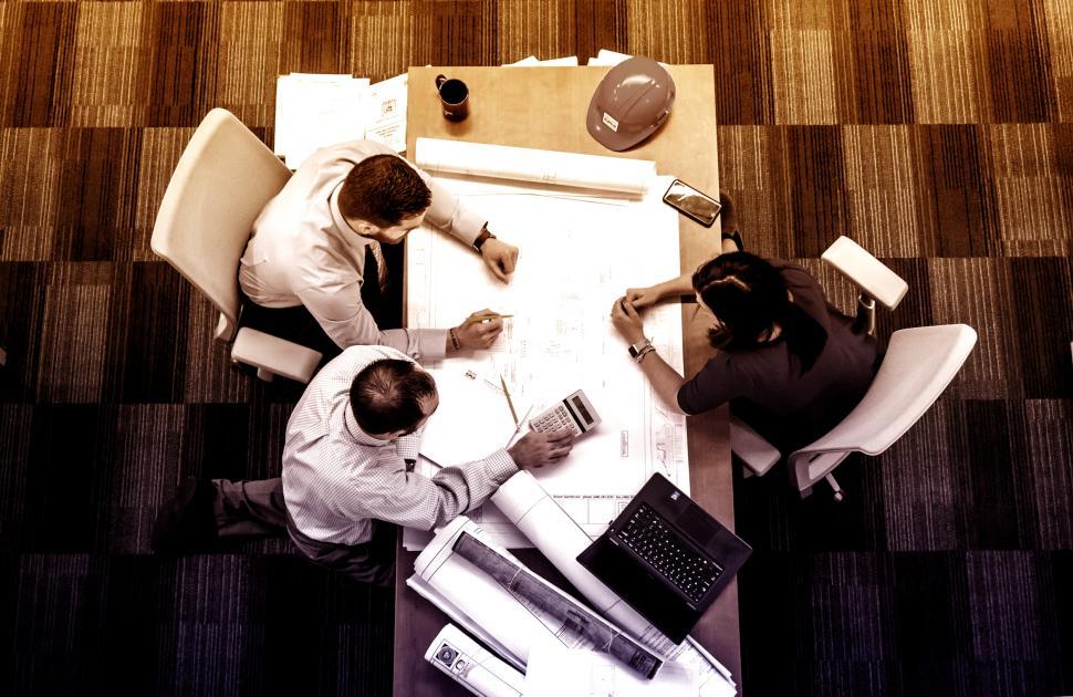 small-team-at-work--teamwork--top-view